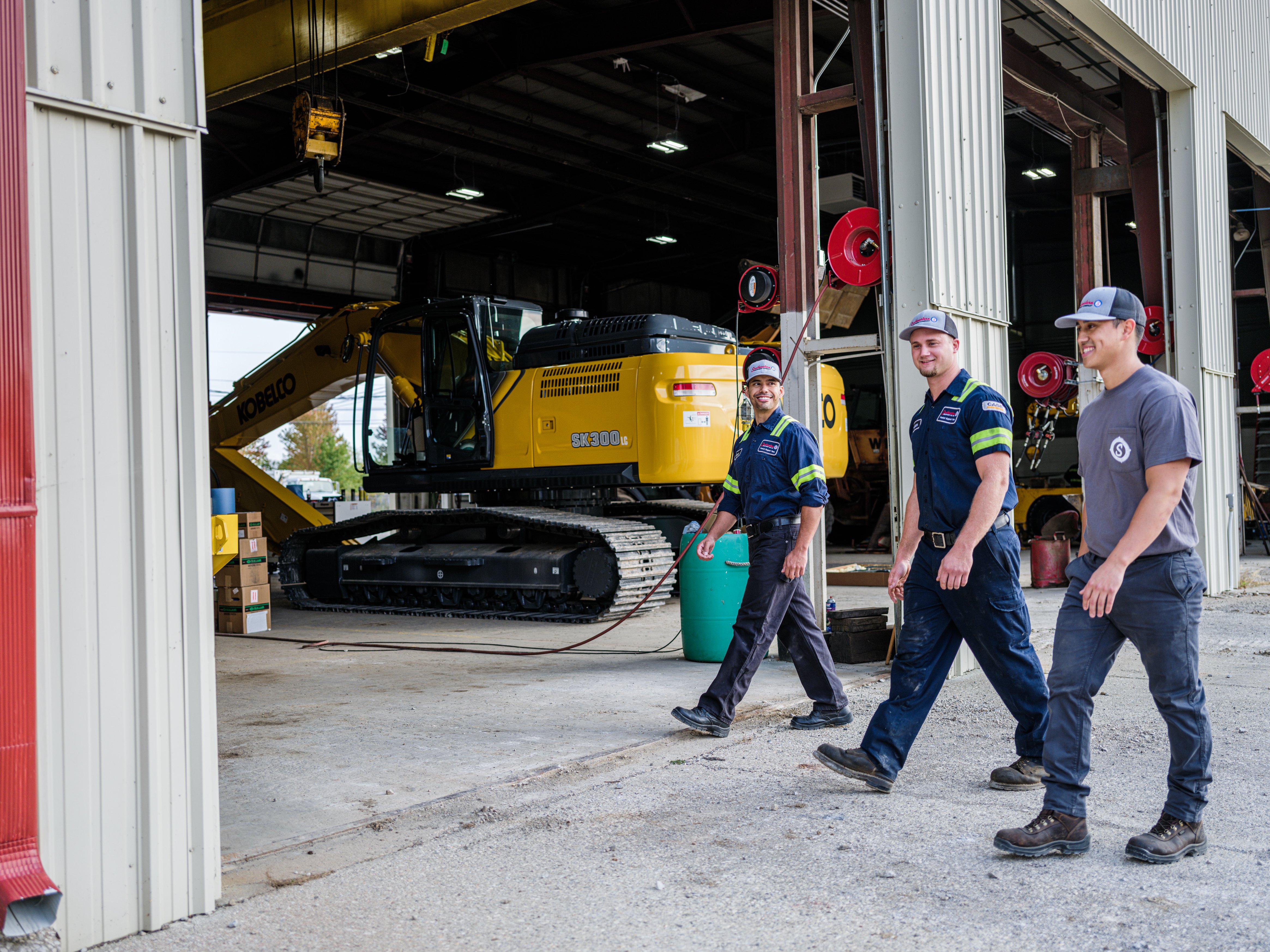 Southeastern Equipment service technicians outside a service shop